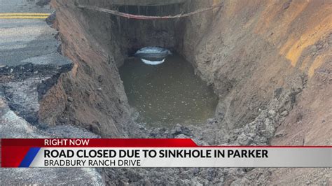 Road gives way to create sinkhole in Parker